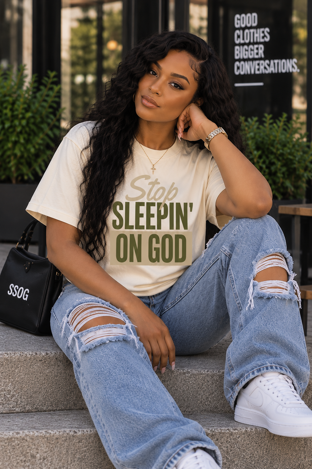 Female model wearing CLASSIC LOGO TEE — CREAM/OLIVE